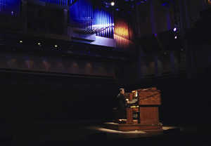 Man playing organ. Photo.